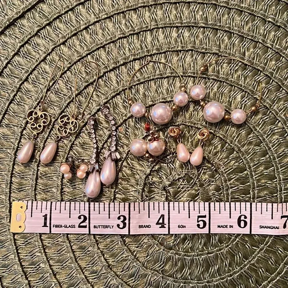6 pair vintage faux pearl and gold colored earrings EVC